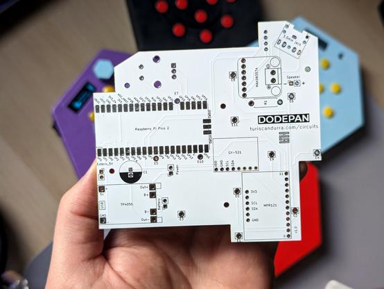 A white, unpopulated PCB. The label says "Dodepan".