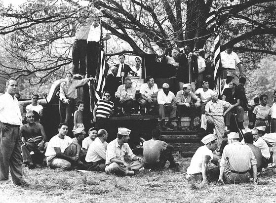 September 4, 1949 - Paul Robeson, scholar, athlete, musician and leader, defying a racist and red-baiting mob, sang to 15,000 at a Labor Day gathering in Peekskill, New York.
During the event, screaming local mobs blocked the entrance to the concert area and harassed concertgoers. The veterans’ groups paraded along the highway, automobile horns blared and bands played. Attackers screamed: “We’re Hitler’s boys — here to finish his job.”
