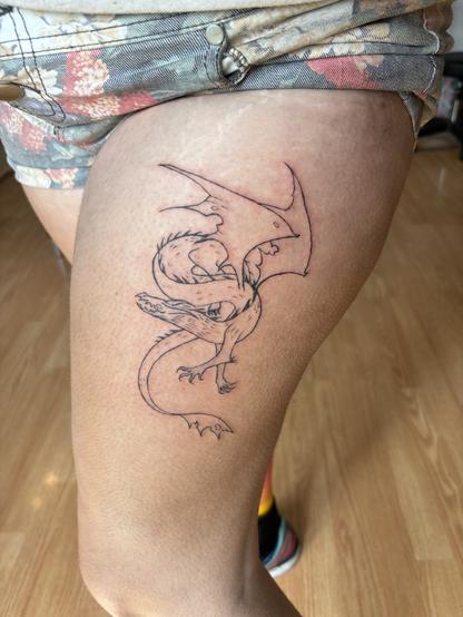 A photo of the tattoo, after I finished the lines and before I did the shading