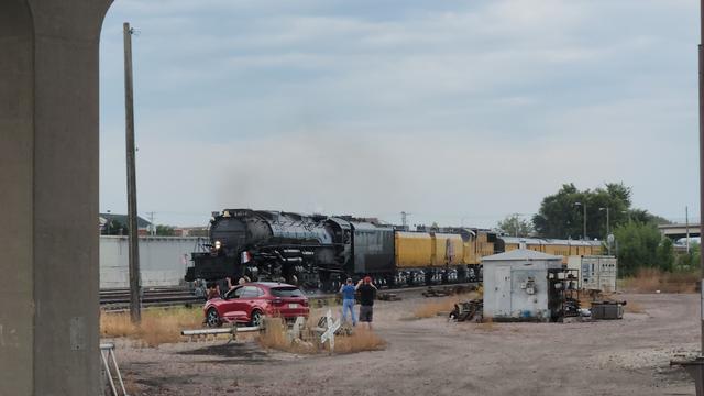 Large steam engine UP 4014 driving by