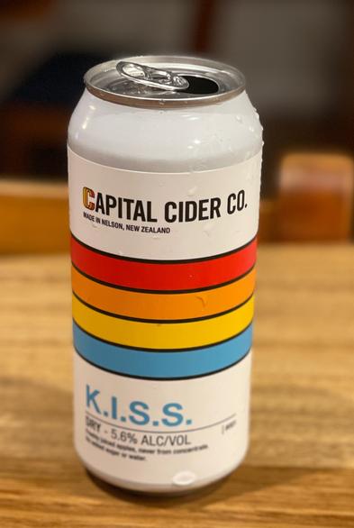 A colour photo of a can of apple cider. The can has a four colored stripes: The label reads:
Capital Cider Co
Made in Nelson, New Zealand

K.I.S.S
Dry - 5.6% ALC/Vol