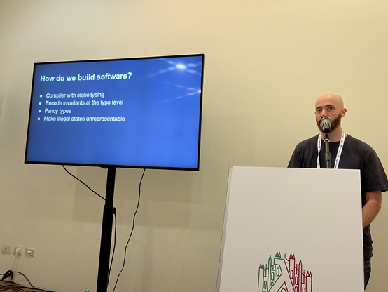 Photo of Marco Sampellegrini giving his talk.