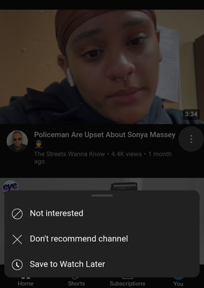 screencapture of "the streets wanna know" channel on youtube but with the "don't recommend channel" box open - the featured video displays the title text "policeman are upset about sonya massey" and shows a woman, who is probably a cop, looking sadly into the camera