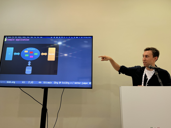 Photo of Markus Schlegel giving his talk.