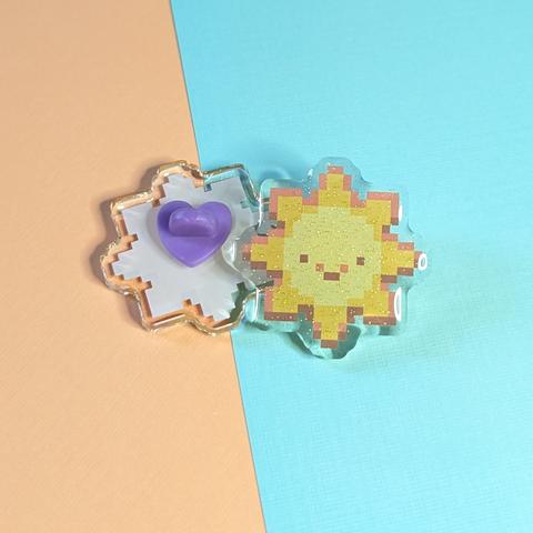 Pixel art acrylic pin of a sun