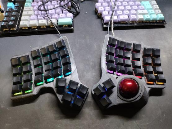 Freshly build bastardkb charybdis on a desktop.