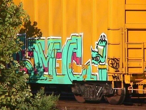 A Mavica picture of graffiti on the side of a Union Pacific boxcar