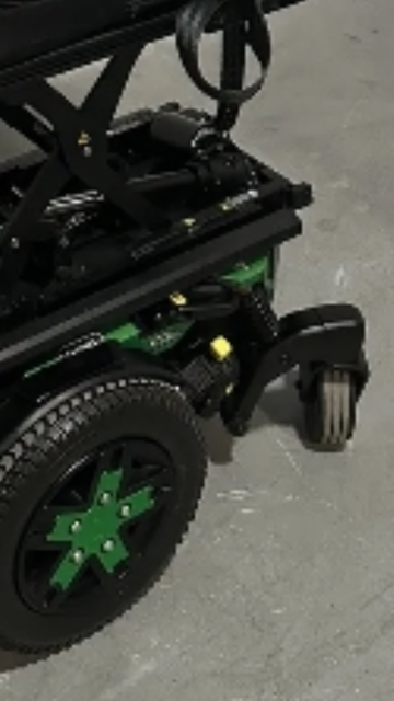 Power chair sneak peek- it’s mostly black with a green accent!
