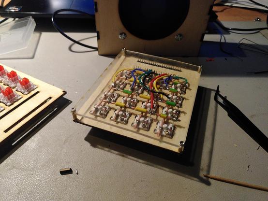 back of the macropad, can see the wires behind an acrylic sheet