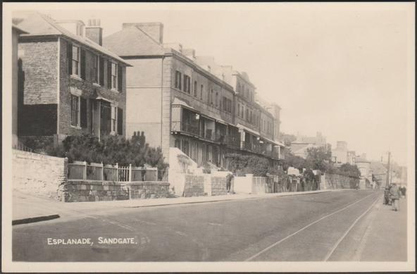 Monochrome real photographic postcard showing a view of the Esplanade at Sandgate, between Folkestone and Hythe in Kent.
Publisher not stated, not numbered, c.1940s.
Postally unused.
Very good condition, with minimal corner bumps.