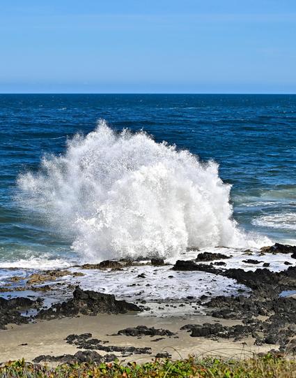Thor’s Well is a bowl-shaped hole carved into the basalt shoreline of Cape Perpetua in Oregon. The seemingly bottomless well perpetually fills and drains throughout the day. Researchers now believe that Thor’s Well began as a large sea cave. The sea cave slowly formed over thousands of years as waves crashed into the volcanic rock that made up the shoreline. It eventually collapsed, leaving a bowl-shaped hole just feet from shore. During high tide, water shoots out the top like a geyser, reaching heights of up to 40 feet.