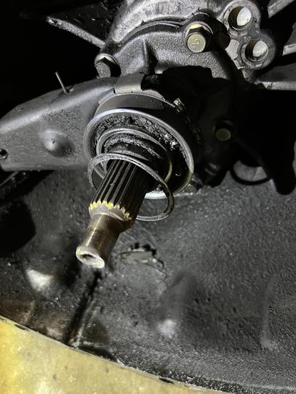 A toasted Miata throwout bearing with guts puked out.