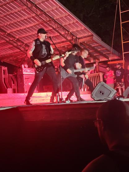 (Left to right) Jason Netherton (bass and lead vocals), Mark Kloeppel (playing guitar) and Darin Morris (playing guitar). Performing live at Full Terror Assault on September 5th, 2024.