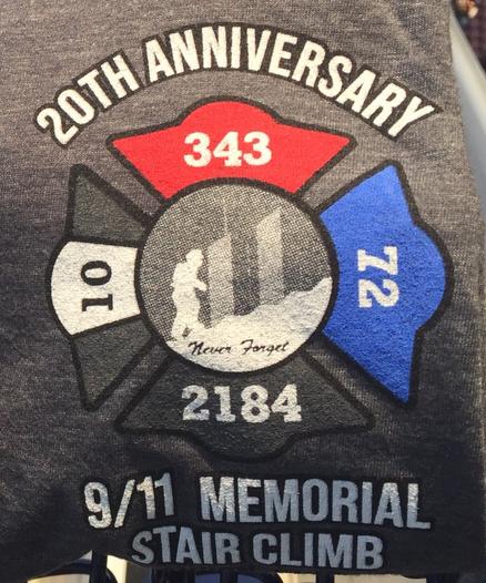 Color image of the shirt logo from the 911 Memorial Stairclimb, Akron, Ohio, USA, September 11, 2021, commemorating the victims of the 9/11 terrorist attacks in NYC, the Pentagon, and Shanksville, Pennsylvania.