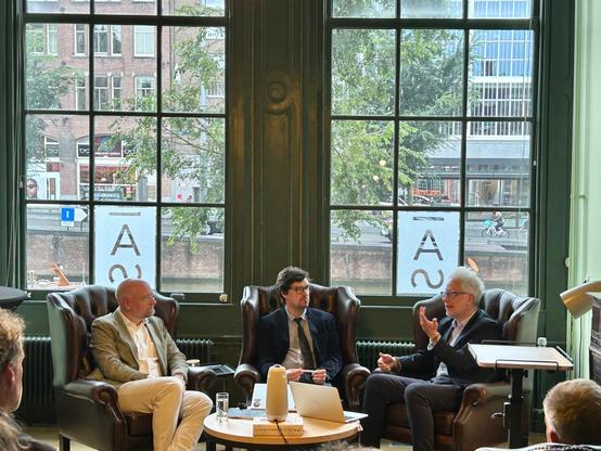 Brian Castellani, Jonathan Winstow and Lasse Gerrits sitting in chairs while talking about the book. Picture by Min Cai