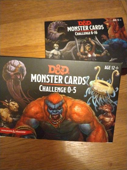 Two boxes of Gale Force 9 DND monster reference cards, challenge levels 0-16.