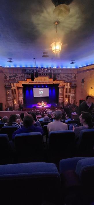 Theater designed with an ancient Egyptian theme, murals, staututes, and columns