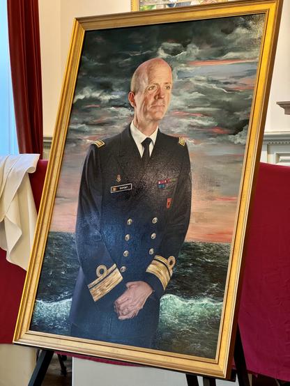 Portret van divisie-admiraal Dupont, in uniform van de Marine en met de zee op de achtergrond.