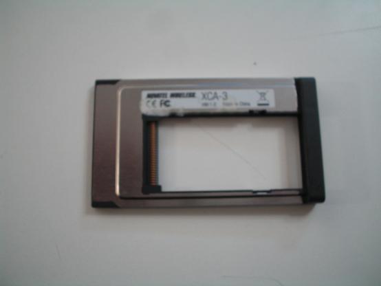 The reverse side of a Novatel #Wireless XCA-3 ExpressCard to PC Card Adapter.