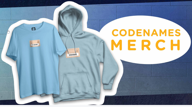 Screenshot aus einem Onlineshop

Ein blaues / türkises T-Shirt, vorn mittig eine Karte aus dem Spiel Codenames, darauf der Begriff "T-SHIRT"
Daneben in einem ähnlichen, aber matterem Farbton ein Hoodie. Auf dem auf der Front ebenfalls die Abbildung einer Spielkarte aus Codenames, mit dem Begriff "HOODIE".
Weiter rechts ein weißes Oval ähnlich einer Sprechblase: "Codenames Merch"
