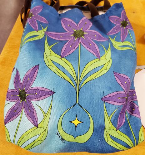 Coast Salish purple camas floral art design on canvas bag.