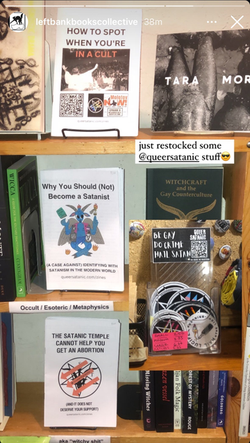 screenshot from Left Bank Books showing refilled satanic antifascist stickers and zines for “How to Spot If You’re In A Cult”, “Why You Should (Not) Become A Satanist”, and “The Satanic Temple Cannot Help You Get An Abortion”