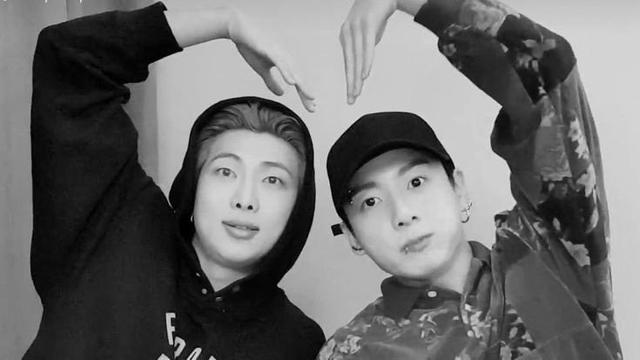 namjoon and jungkook doing a heart together with their arms