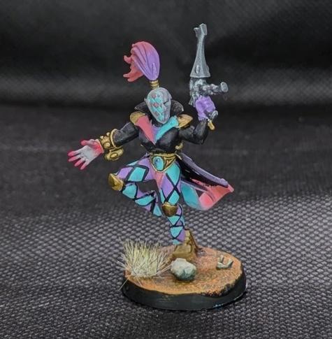 Harlequin with a power glove