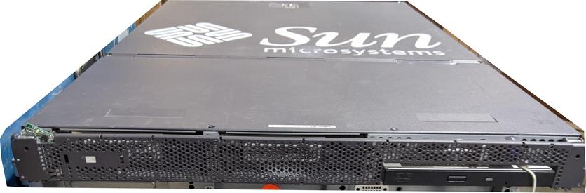 The face of a 1U Sun Microsystems rack mount server, showing the grill face and CD/DVD drive bay