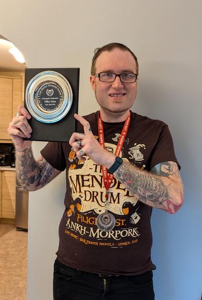 Mark posing with his Cinematic Alchemist Award from India's Luis Bunuel Memorial Awards