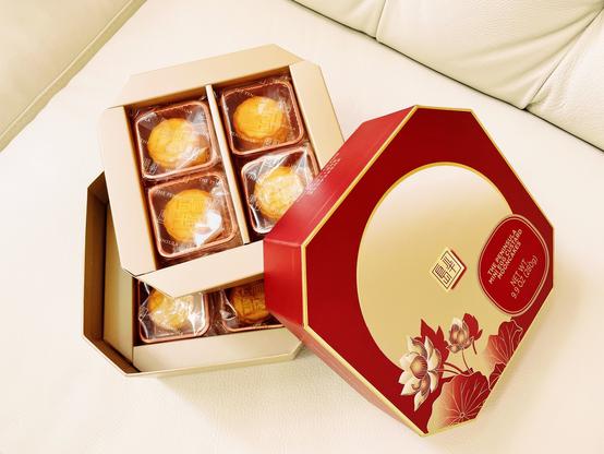 iPhone photo by Jenny Lam of mini mooncakes with egg custard filling from The Peninsula Chicago for Mid-Autumn Festival 2024