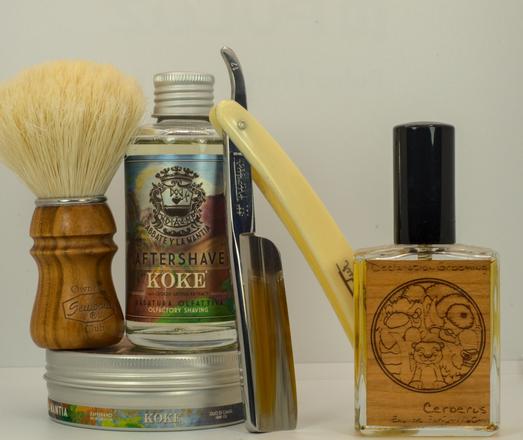 A set of AYLM Koké soap and splash with a chonky Frio 17, a SOC boar brush, and a bottle of NO/HoM/DG Cerberus frag