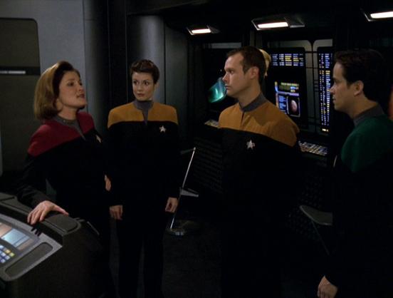 The new team of three under-performing Star Fleet crewmen prep for an away missiion with Capt Janeway.