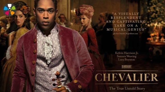 Detail of the film poster for "Chevalier", sowing Kelvin Harrison Jr. as the title character, a handsome Black man in 18th century French court dress, looking confidently at the viewer while holding a violin in his left hand.