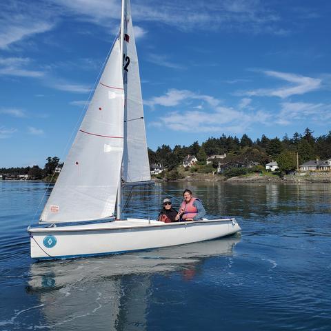 Me & Ojistoh, in Martin 16 sailboat. In middle of Cadboro Bay waters.