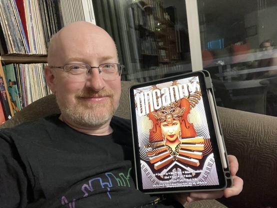 Me holding Uncanny 60 on my iPad