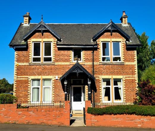 A polychromatic brick house.