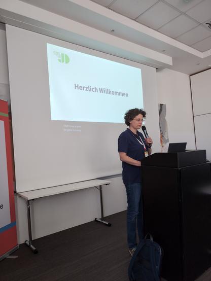Sigrid Gramlinger talking on stage