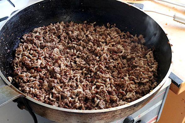 Minced meat in the pan showing browning