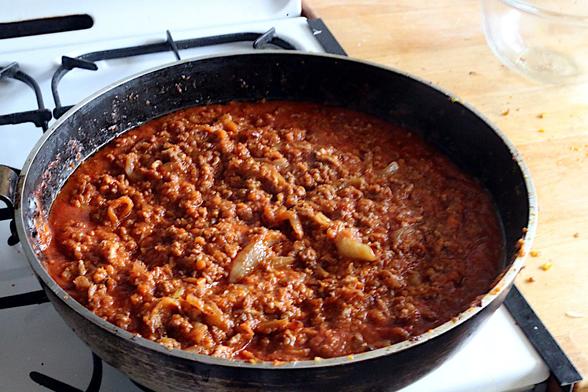 Impasto and onions added back to the pan along with passata