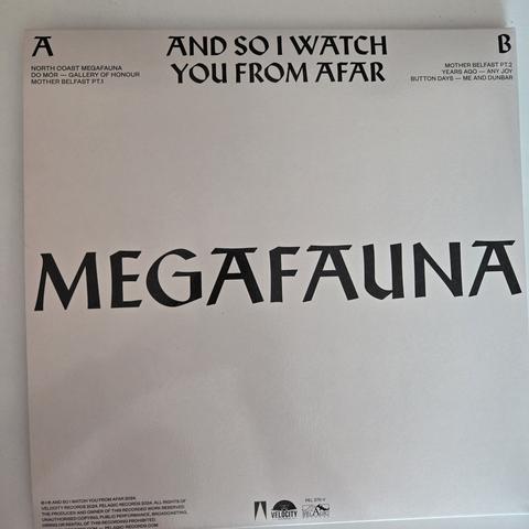 And So I Watch You From Afar's "Megafauna" gatefold LP, back cover
