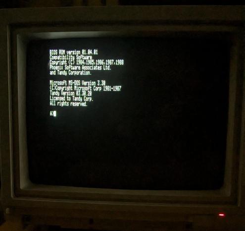 Late 80s Tandy computer/MS-DOS bootup message on a Tandy CRT computer monitor.