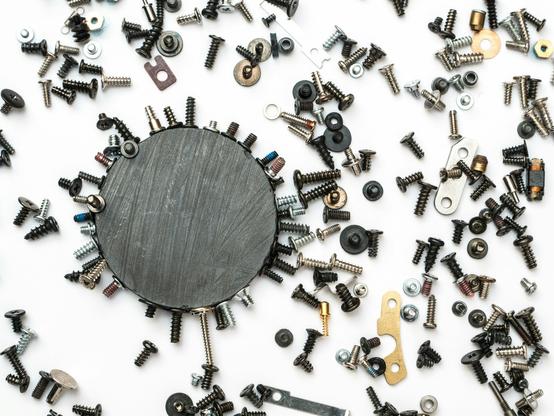 newly machined screws, washers, bolts, etc scattered on a surface
Photo by Dan Cristian Pădureț on Unsplash