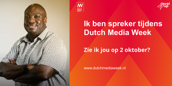 Ian next to Dutch language text about Dutch media week
