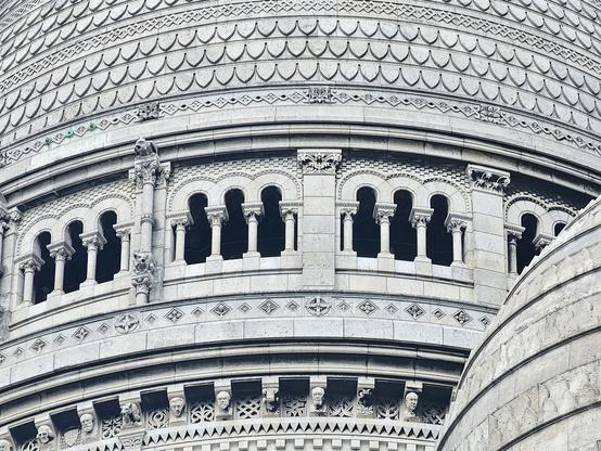 The roof of the Basilique du Sacré-Cœur de Montmartre. All curves and patterns, repeating windows and patterns.