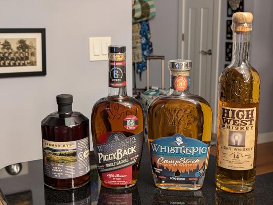 Four bottles from Unicorn Auctions as described in the post.