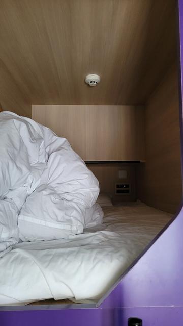 A capsule hotel room.