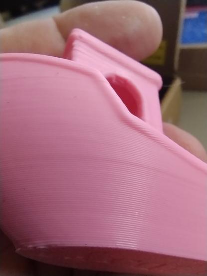 up close picture of the side of the 3D Benchy Boat (Pink PLA)
