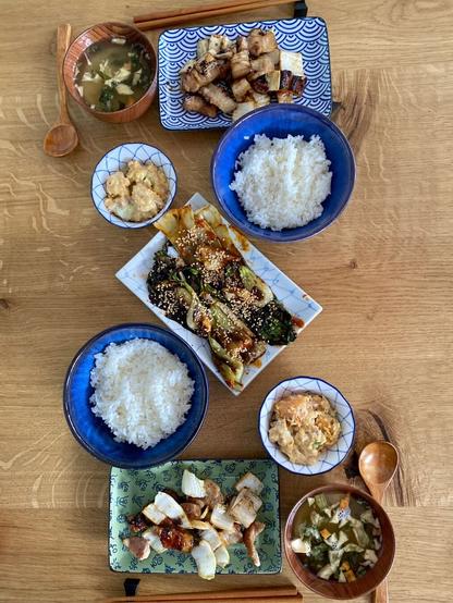 View from the top to show the whole meal with each item in bowls or on plates.