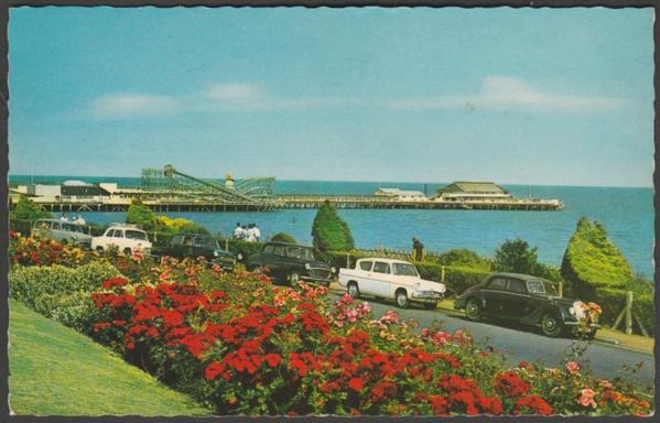 Printed colour postcard showing a view of the pier at Clacton in Essex.
Published by D. Constance Limited, Littlehampton, No K. 411, c.1960s.
Postally unused.
Very good condition, with very slight corner bumps.